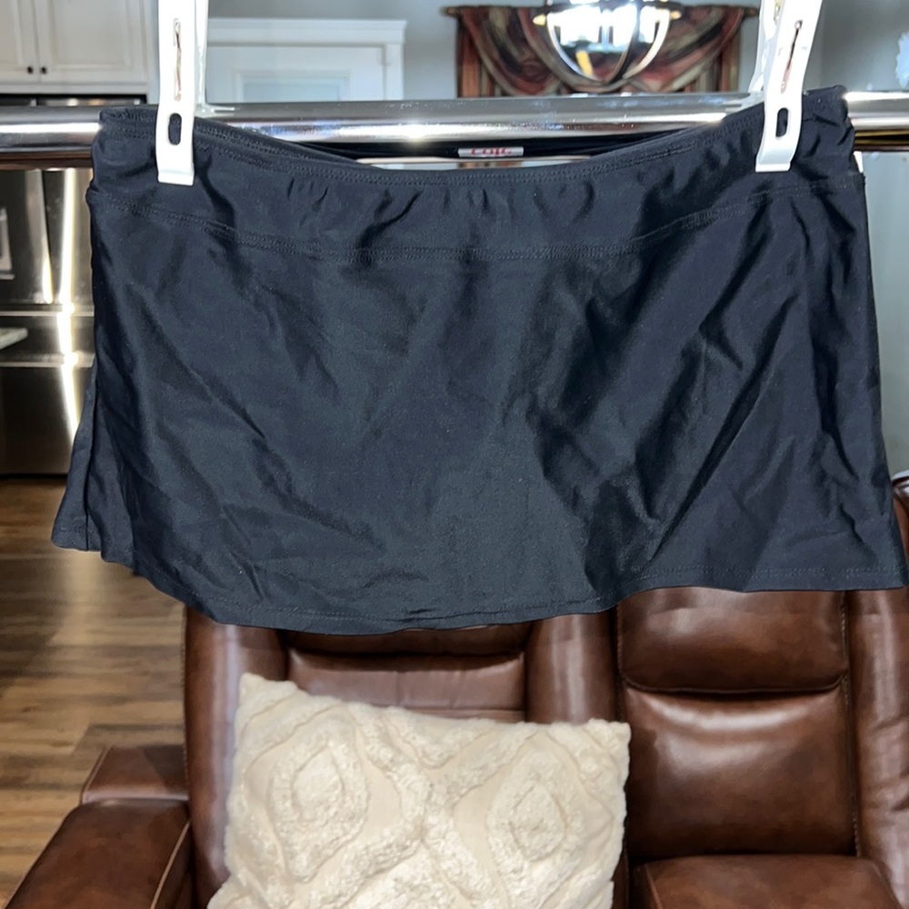 Women’s small black swimsuit skirted bottom